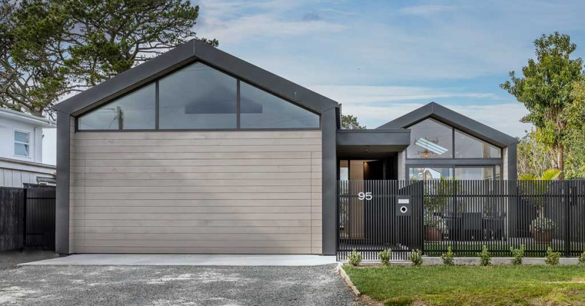 Invisible Garage Door on Architectural Home by Auckland Build 360